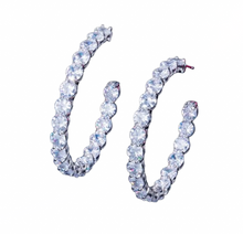 Load image into Gallery viewer, Bling CZ hoop earrings with sparkling stones Woman wearing sparkly CZ hoop earrings